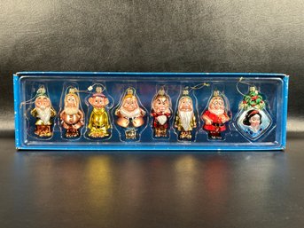 A Package Of Collectible Disney Ornaments In Hand-Blown Glass: Snow White & The Seven Dwarves