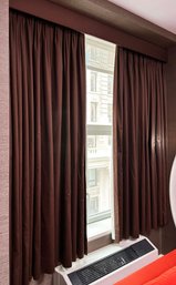 A Set Of Luxe Modern Lined Blackout Drapes And Valence In Chocolate Satin