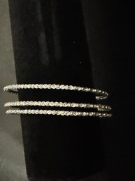 3 Silver Toned Bracelets