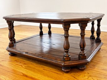 A Fine Quality Carved And Notched Walnut Coffee Table In Spanish Revival Style