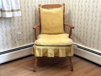 A Charming Vintage Chair With Yellow Corduroy Cushions