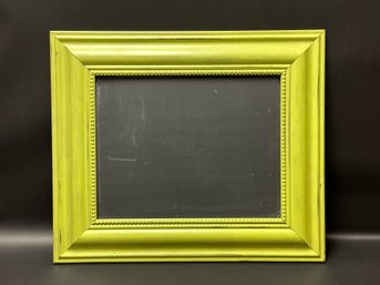 A Chalk Board In A Lime Green Wood Frame