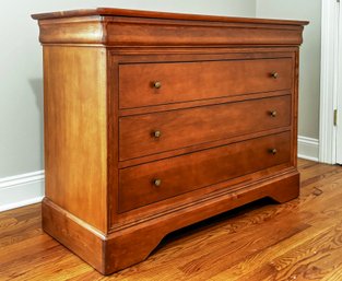 A Chest Of Drawers In Mahogany Finish By Mobilier Furniture Of Canada