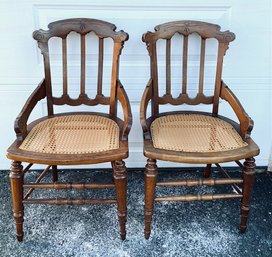 Antique Pair Of Wooden Carved Spinal Back Chairs With Cane Seats