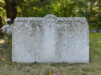 Gravestone With Circular Heart Motif At The Center