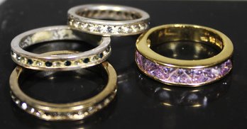 Lot Four Ladies Band Rings, Two Are Sterling Silver Having CZ Stones