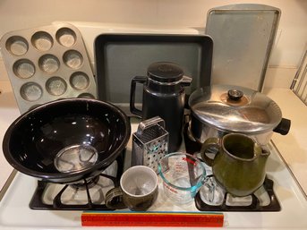 Assorted Kitchen Cookware: Pyrex, Pottery, Stainless Pot, Muffin Pan, Coffee Carafe, Pans, Bowl, Grater