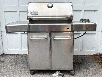 A Weber Genesis Propane Grill