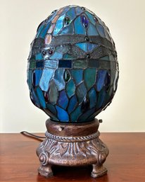 A Rare Tiffany Style Stained Glass Egg Form Accent Lamp