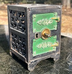 A Tiny Antique Cast Iron Safe/Bank Or Toy