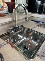 A Very Mod Stainless Steel Bar Sink And Chrome Faucet  - Family Room