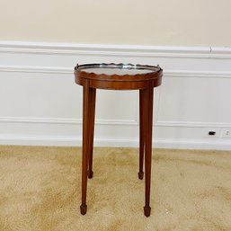 A Tibbenham Mahogany Occasional Table With A Silver Plate Tray Insert And Pie Crust Edge
