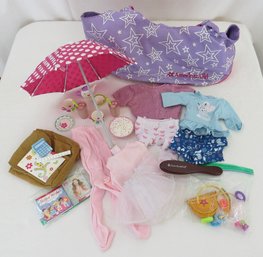 An American Girl Doll Bag With Doll Clothes And Accessories