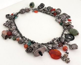 An Asian Gemstone And Silver Necklace