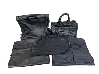 Collection Of Garment And Travel Bags