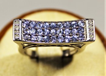 Size 7 Sterling Silver Tanzanite Designer Ring Having White Stones