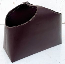 A Leather Magazine Rack By Crate & Barrel