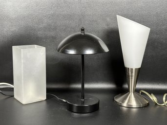 A Trio Of Modern Lamps In Black & White