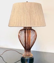 A Copper Wire Urn Form Lamp With Rope Shade