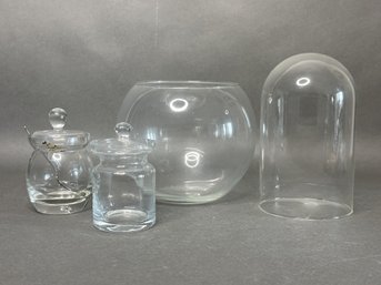 A Grouping Of Clear Glass Items