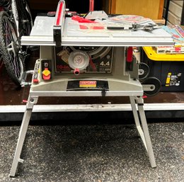 A Craftsman 10' Table Saw And Foldable Table