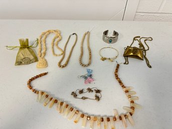 A Group Of Custom Jewelry & More