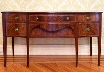 A Vintage Flame Mahogany Serpentine Front Sheraton Sideboard