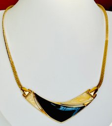 SIGNED TRIFARI GOLD TONE CREAM AND BLACK ENAMEL NECKLACE