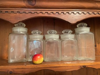 Set Of Five Glass Lidded Containers/canisters.