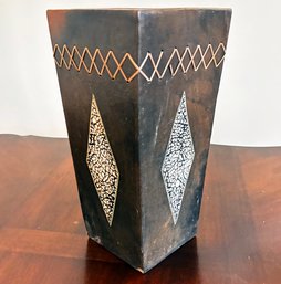 An Earthenware Vase With Woven Banding