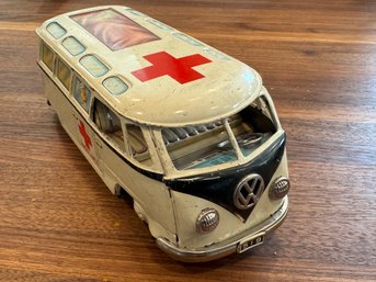 A RARE VOLKSWAGON BUS TIN LITHOGRAPH AMBULANCE