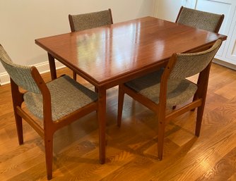 MCM Danish Teak Table With Attached Hidden Slide Out Extensions Plus 4 Matching Chairs