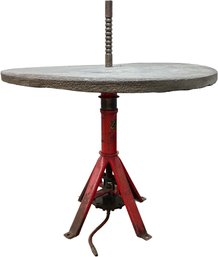 A Bespoke Occasional Table With Vintage Machine Base And Bluestone Top