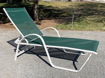 An Aluminum And Mesh Outdoor Lounge Chair By Winston