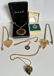 10 Karat Gold Texas Pendant & 6 Pendant Necklaces Including Locket, Leaf, Calendar On Heart & More