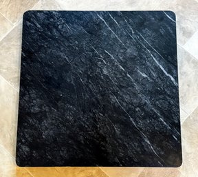 A Marble Cutting Or Serving Board