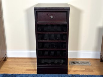 A Wine Cabinet By Crate & Barrel In A Dark Cherry Stain