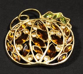 Vintage Gold Tone Pumpkin Formed Brooch Having Rhinestones