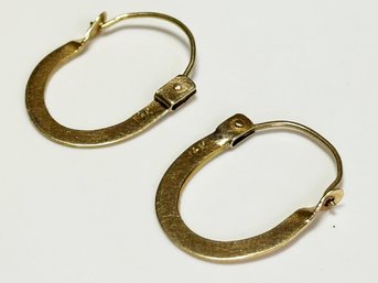 A Pair Of Vintage Modern 14K Gold Earrings