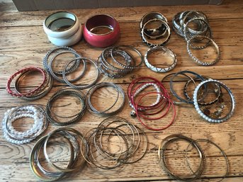 Over 70 Assorted Bangles.   14A