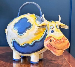 A Tole Painted Metal Cow