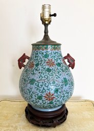 An Antique Chinese Vase, Fitted For Electricity As Lamp