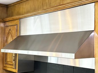 A Stainless Steel Range Hood, Likely Thermador