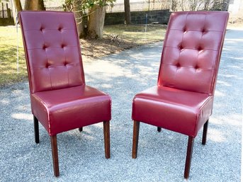 A Pair Of Contemporary Tufted Side Chairs In Oxblood Leather.
