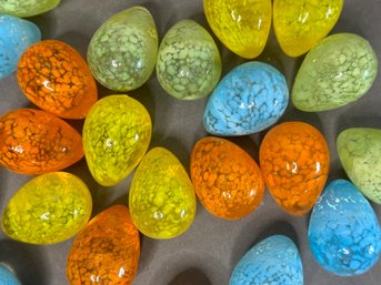 A Collection Of Speckled Art Glass Eggs