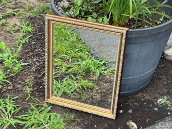 Pretty Mirror With Gold Toned Frame