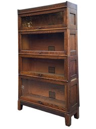 A Vintage Paneled Oak Barrister Case By The Melton-Rhodes Company