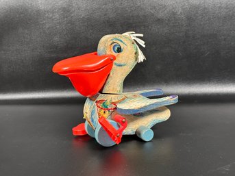 A Charming Vintage Pelican Pull Toy In Wood