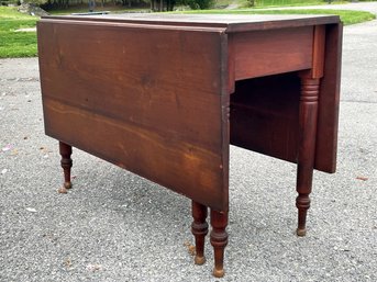 A 19th Century Mahogany Gate Leg Drop Leaf Dining Table