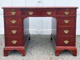 A Vintage Kneehole Desk With Inlaid Parquetry Top